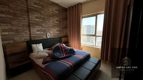 For annual rent: Stunning furnished 2BHK in Garden City Towers, Ajman. Clean furniture, spacious, private parking & free WiFi. 43k AED.