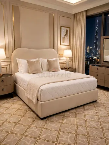 Beige upholstered king bed with matching bedside tables and dresser - good condition