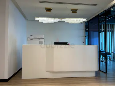 Modern white reception desk with built-in counter - good condition