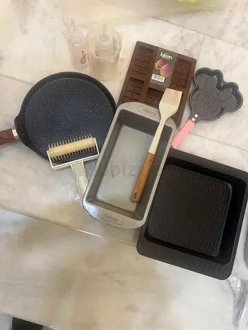 Assorted baking pans and kitchen utensils - used set