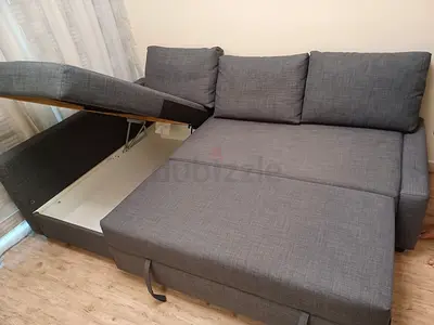 Gray Fabric L-Shaped Sofa Bed with Storage - Good Condition
