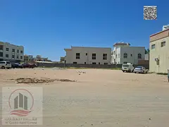 Residential/commercial land for sale on a street in Ajman, Al Muwaihat 1 area, 6000 sq ft