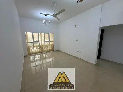 One-bedroom apartment with spacious living areas, central air conditioning, ground floor location, prime location, and easy payment options.