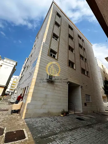 Investment building for sale in Al Qulay'ah, Sharjah.