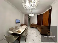 Two master bedrooms, large furnished living room, three balconies with open views, gym, swimming poo
