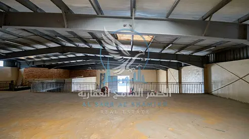 Warehouse in Al Sajaa | Prime Strategic Location | Main Road | Spacious Area | Modern Design | Mezzanine | 3-Phase Electricity | Suitable for Various