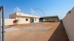 Industrial Yard for Rent in Al Sajaa 10,000 Sq Ft with Covered Shed and Offices
