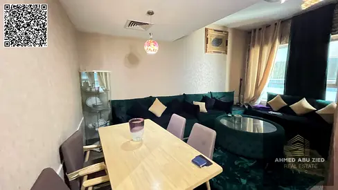 Furnished 2BR Hall for annual rent in Garden City Towers Ajman near Ajman Court featuring excellent space clean furniture private parking and free int
