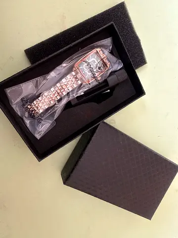 Rose gold women's dress watch with metal bracelet - like new