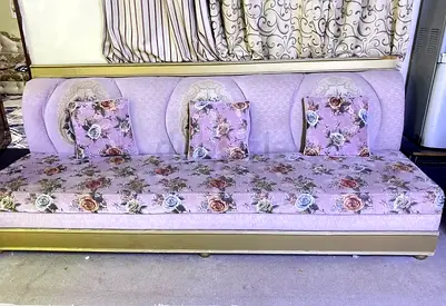 Long floral upholstered sofa / daybed - good condition
