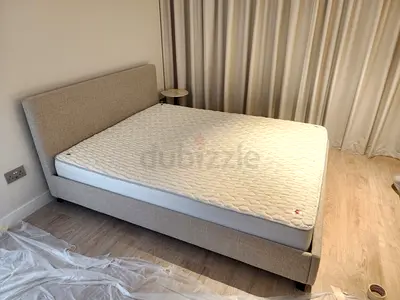 Queen fabric bed frame with mattress - neutral beige, good condition