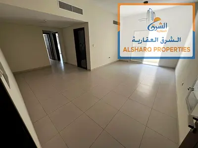 غرفتين وصالة بالراشدية 1، مساحة واسعة، تكييف مركزي، حمامان، موقع مميز ومخارج سهلة للشارقة ودبي.