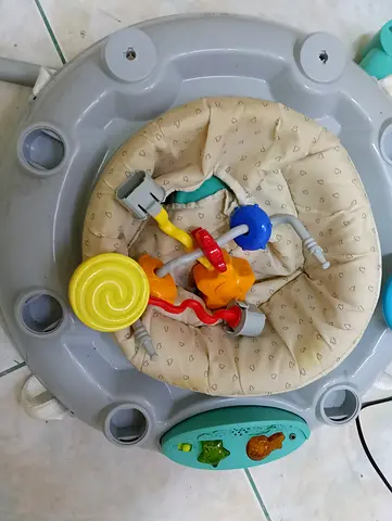 Baby activity jumper/exersau with toys - gently used