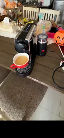 Nespresso coffee machine with molk maker