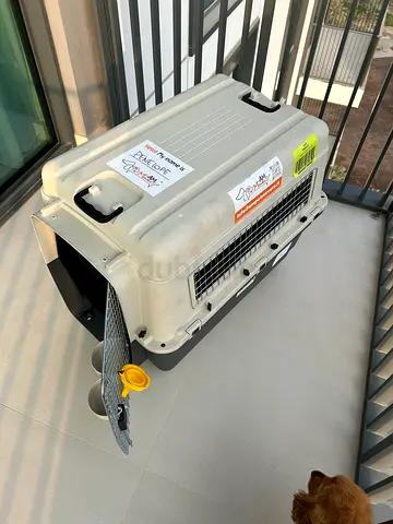 IATA-certified pet carrier/crate with metal door. Used only once - perfect for cargo or daily use.