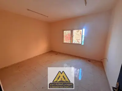 For Annual Rent | 3 Bedrooms + Living Room, Al Nuaimiya 1, Ajman. Spacious apartment opposite Al Hikma School, with master bedroom, 3 bathrooms & balc