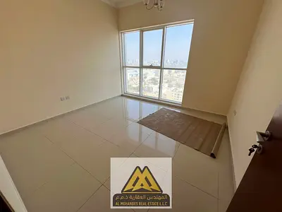 Two bedrooms and a large living room/balcony with a distinctive view/in the Liwar 1 area, Ajman Corniche, close to all services and main roads