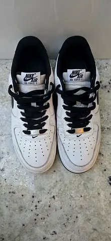 Nike Air Force 1 '07  White low-top sneakers with black Swoosh - used