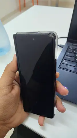 Samsung Galaxy Zfold3 with clear protective case - front display broker middle display having line.