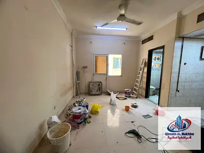 Large Al Majarra studio with a separate kitchen, central AC and gas, conveniently located near the park and Corniche.