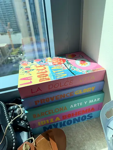 Set of colorful coffee-table travel books decor (Barcelona, Provence, Ibiza, La Dolce Vita)