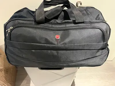 Medium black soft travel bag