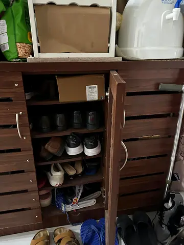 Used wooden shoe cabinet with multiple shelves - holds 10+ pairs