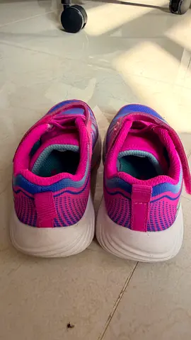 Lightly used pink and purple kids' sneakers, size EU 24