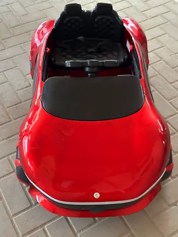 Red Ride-On Toy Car for Toddlers - Good Condition, Needs battery replacement, Bargaining Allowed