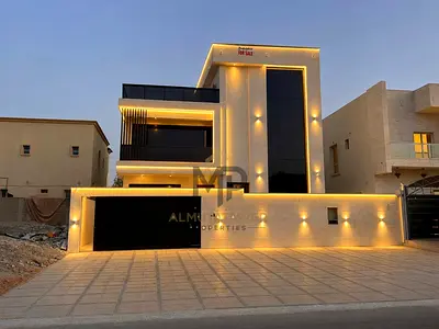 Electricity, water connections, and central air conditioning included: Modern luxury villa for sale in Al Yasmeen, Ajman | 5 master bedrooms | Fully e
