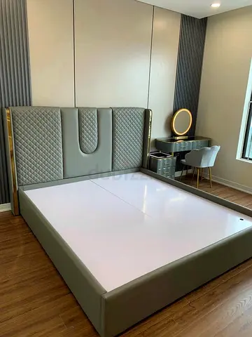 Modern upholstered king-size bed frame with headboard