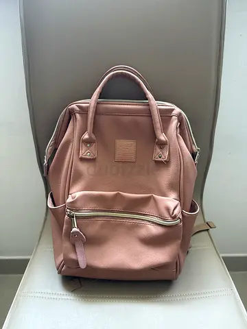Light brown leather-look backpack — very light  used