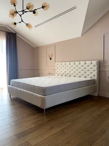 Queen upholstered bed frame with tufted headboard - like new