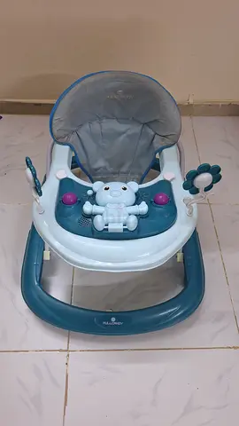 Baby walker with activity tray — gently used