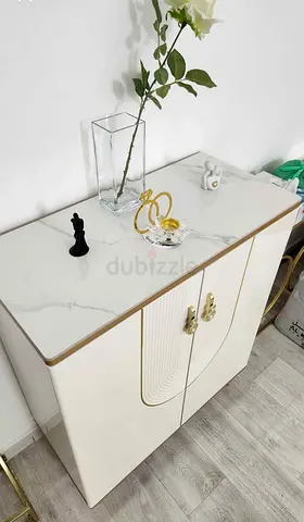Compact White Marble-Top Storage Cabinet with Gold Handles