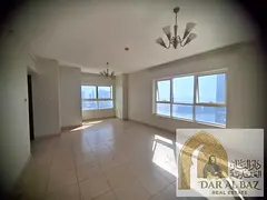 Beautiful two bedrooms and a living room with parking, gym, swimming pool, balcony, maid's room, 4 b