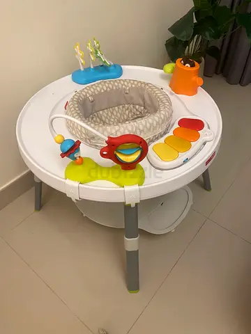 Baby activity jumper/exersaucer with toys - good condition