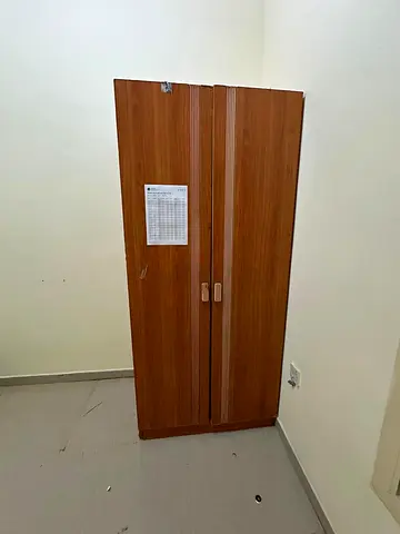 Two-door wooden cupboard for sale