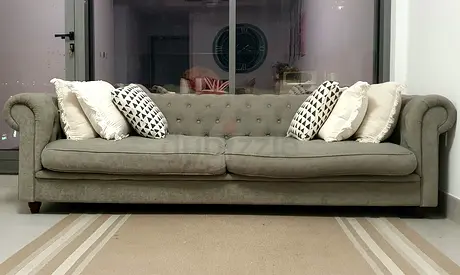 Set of 2 Marina home - 4 seater Chesterfield-style Sofa in Light Grey - both are in Good Condition
