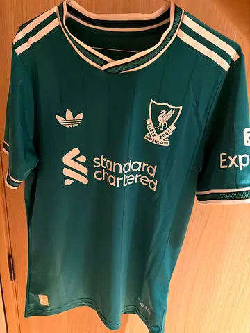 Green Liverpool football jersey (size unknown) - used