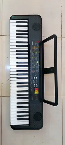 Used 61-Key Portable Electronic Keyboard with Built-in Speakers
