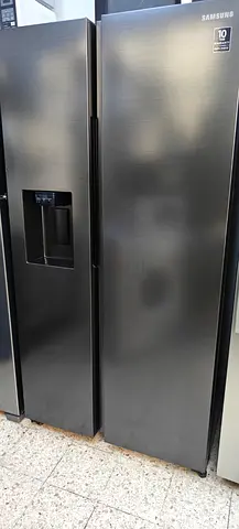 Samsung brand side by side fridge freezer with water dispenser and ice maker