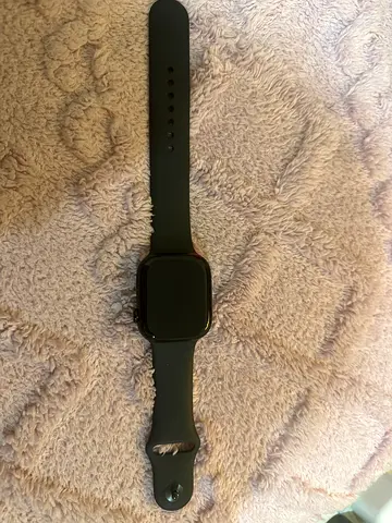 Used black smartwatch with silicone band - good working condition