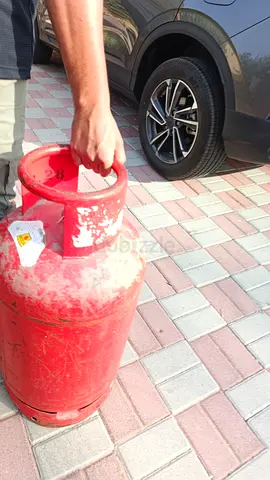 Used red LPG gas cylinder - single tank, good condition