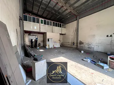 مستودع بمساحة ١٠٠ متر مربع مع طابق نصفي للإيجار في مصفح