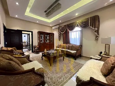 For Sale: Residential and Commercial Villa in Al Rawda 2, Ajman, near the mosque, on Al Tallah Street with a garden, 5 bedrooms, majlis, 3 living room