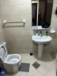 Room with separate washroom n shared kitchen for a couple/bachelor in 2 bhk flat in clean building