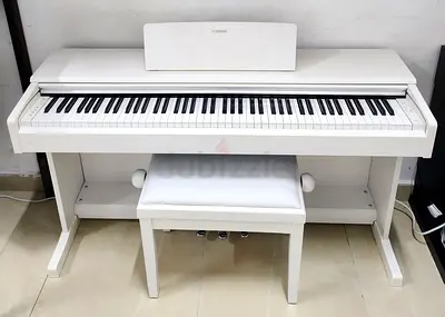 The Yamaha YDP-144 WH (Satin White) is an 88-key digital home piano from the Arius series, featuring