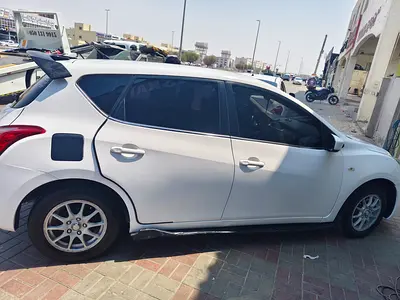 2014 Nissan TIIDA — фото 11