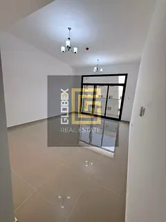 Spacious Two-Bedroom Apartment with Large Living Room for Annual Rent in Al Jurf 3